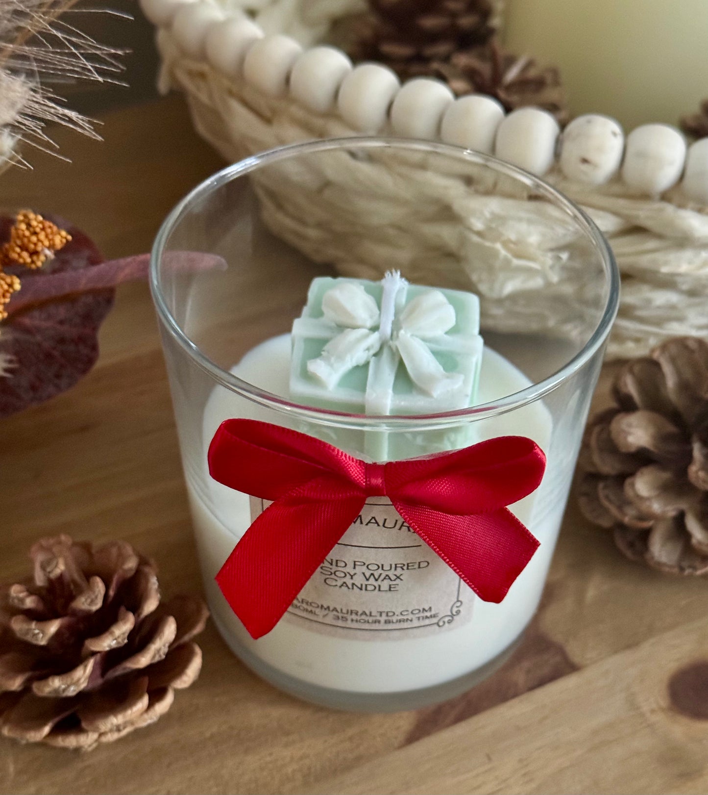 A Christmas candle green present