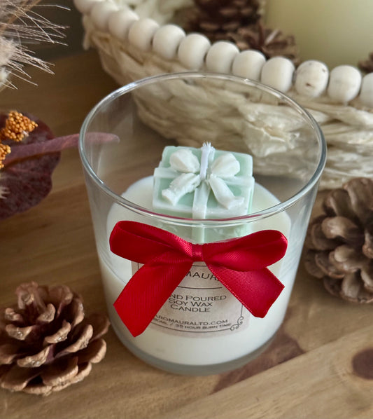 A Christmas candle green present