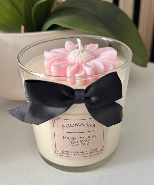 Pink daisy candle